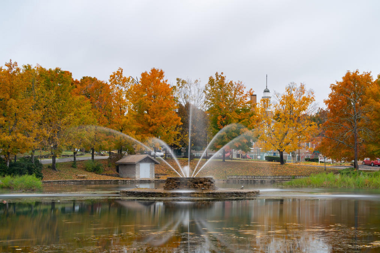 Park fountain surrounded by colorful autumn trees in Fountain City, Knoxville, Tennessee