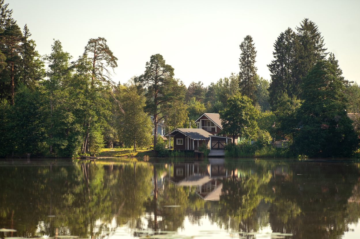 Waterfront home reflected in a quiet pond in the Mentor community of Blount County, Tennessee
