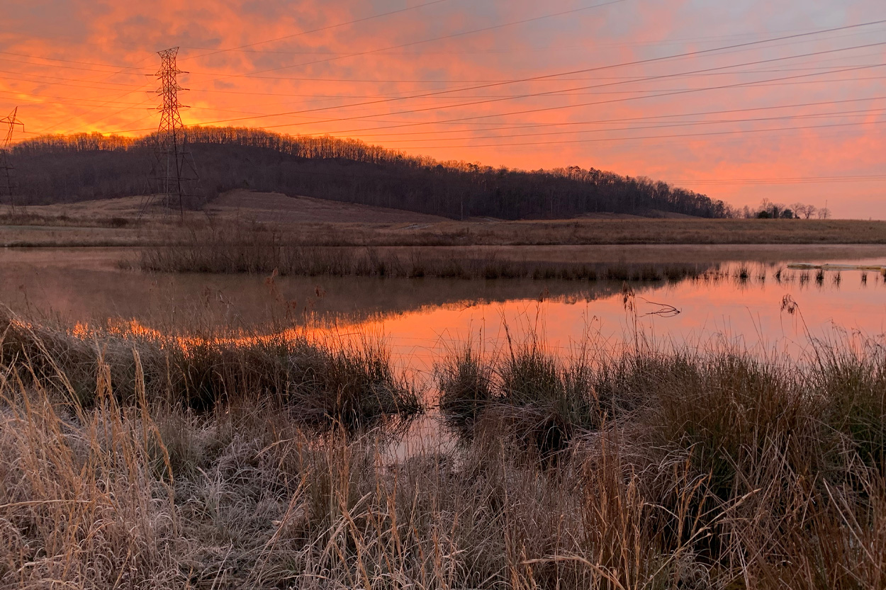 Wetland reflecting a colorful sunset near Midtown in Roane County, Tennessee