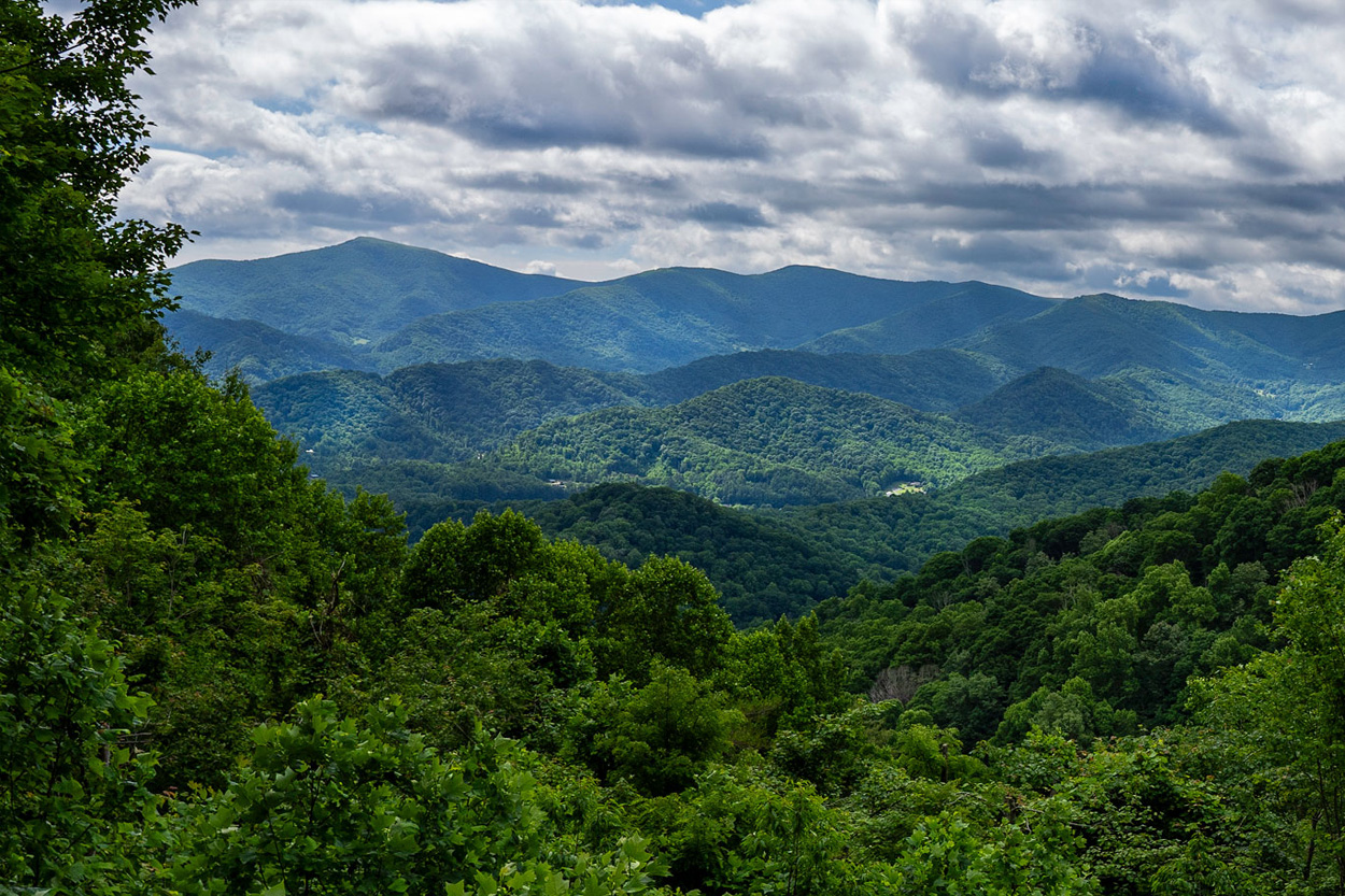 Forested Appalachian mountain ridges beneath cloudy skies near New Market, Tennessee