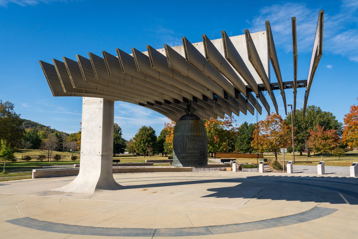 International Friendship Bell pavilion in Oak Ridge, Tennessee, beneath a clear blue sky