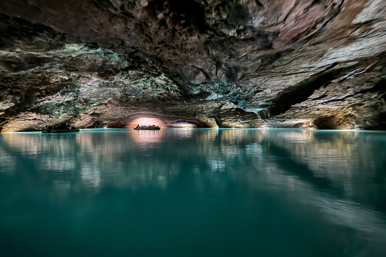 Clear blue underground water surrounded by limestone rock near Sweetwater, Tennessee