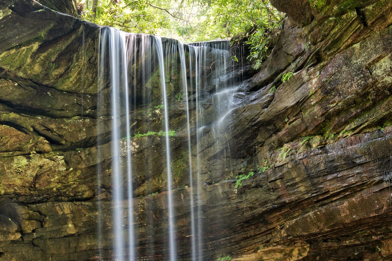 Waterfall cascading over a sandstone cliff near Allardt in Fentress County, Tennessee