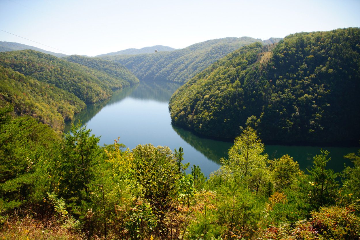 Winding lake surrounded by forested hills near Ball Play in Monroe County, Tennessee