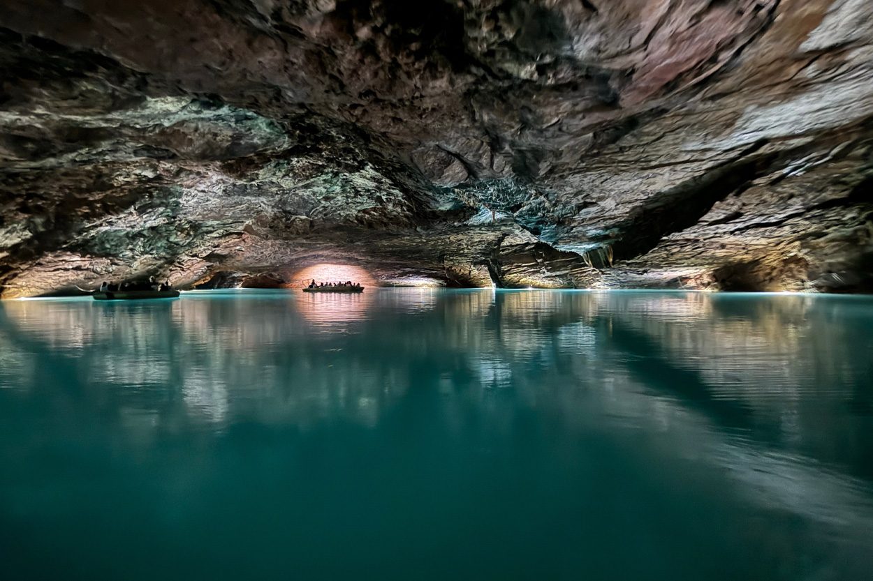 Clear underground lake surrounded by limestone rock near Sweetwater, Tennessee