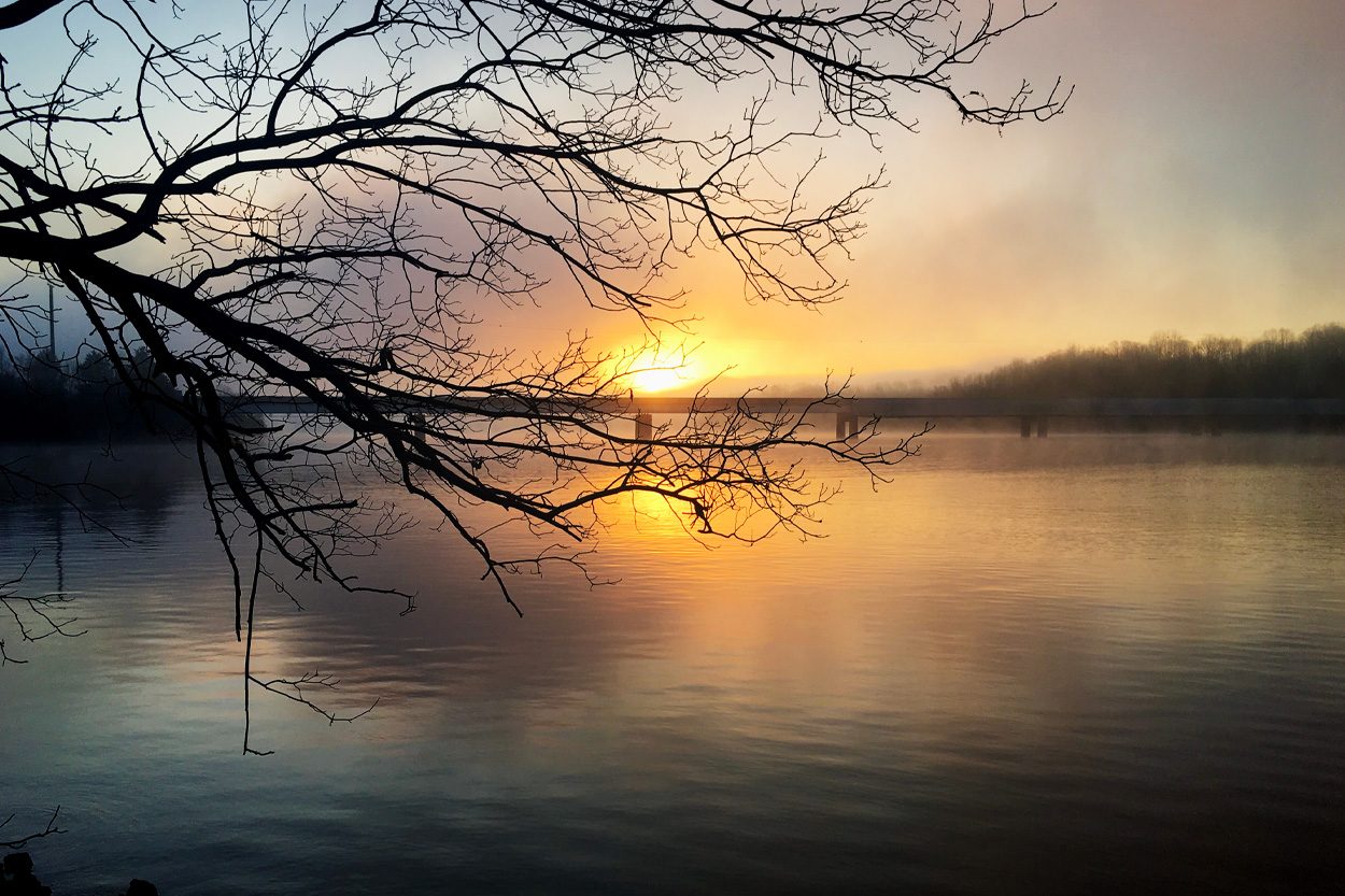 Sunset reflecting across calm water near Thorn Hill in Grainger County, Tennessee